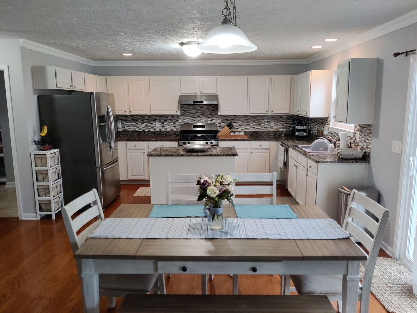 Refinished white kitchen cabinets in Northeast Ohio